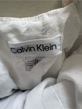 Calvin Klein White and pinky coral dress.